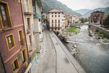 CAMPRODON,SPAIN-JULY 13,2015: View of houses and river Ter in catalan village of Camprodon, Pyrenees, Catalonia, Spain.のeditorial素材