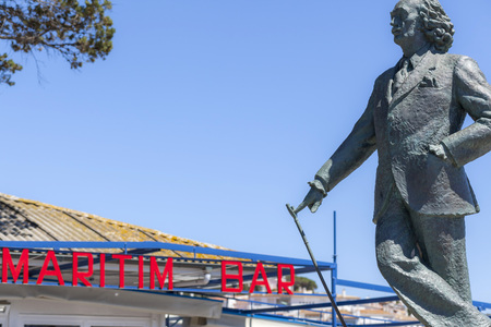 CADAQUES,SPAIN-MAY 21,2015: Sculpture statue tribute to Salvador Dali and maritim bar sign in Cadaques,Costa Brava, province Girona, Catalonia.のeditorial素材