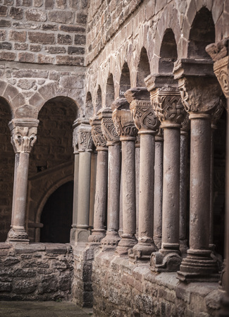L ESTANY,SPAIN-NOVEMBER 21,2014: Cloister, romanesque style, of Monastery of Santa Maria, L Estany, Catalonia, Spain.のeditorial素材