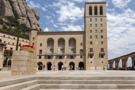MONTSERRAT,SPAIN-JULY 25,2014: Benedictine abbey monastery of Santa Maria de Montserrat, mountain of Montserrat,  touristic destination religious-cultural, province of Barcelona, Catalonia.のeditorial素材