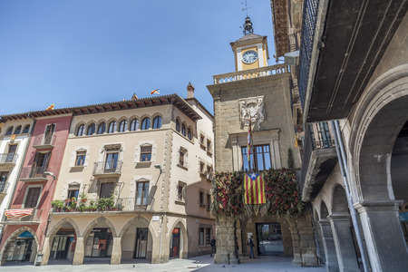 VIC,SPAIN-JUNE 13,2013: City view, City hall, Ajuntament and facade houses in Main Square, Plaza Major or Mercadal, Vic, province Barcelona,Catalonia.のeditorial素材