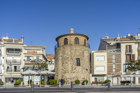 CAMBRILS,SPAIN-JANUARY 17,2012: Maritime promenade and ancient tower of defense in mediterranean town of Cambrils, Costa Daurada, province Tarragona, Catalonia, Spain.のeditorial素材