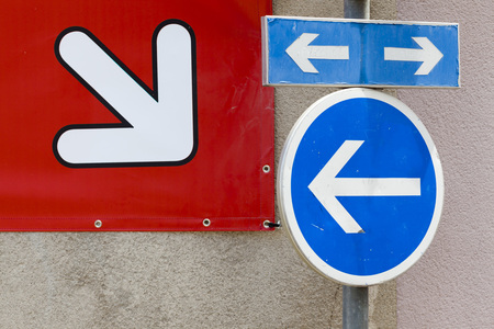 Arrows, various directions, blue and red, traffic sign.