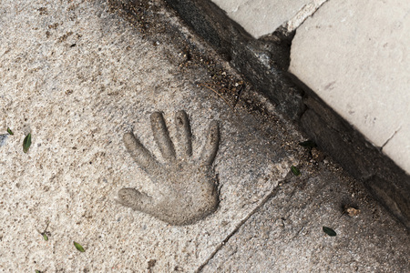 Handprint on the concrete pavement.の写真素材