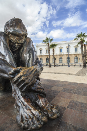 CARTAGENA,SPAIN-SEPTEMBER 22,2017:Urban art,sculpture in bronze, El Zulo by Victor Ochoa in port of Cartagena,Spain.のeditorial素材