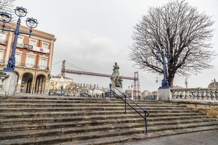PORTUGALETE,SPAIN-JANUARY 12,2017:City view, square, historic center, plaza del solar, at background Vizcaya bridge.Portugalete,Basque Country,Spain.のeditorial素材