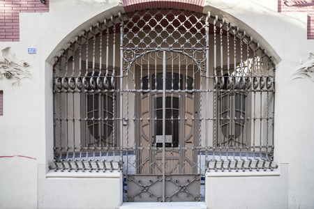 SABADELL,SPAIN-FEBRUARY 22,2017:Artistic door in Ancient Hotel Suizo, Swiss Hotel, modernist style by Juli Batllevell in Sabadell,Catalonia,Spain.のeditorial素材
