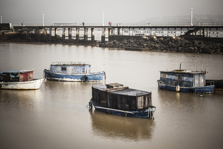 SANTURTZI,SPAIN-JANUARY 12,2017:Old fishing boats in Nervion river.Santurtzi,Basque Country,Spain.のeditorial素材