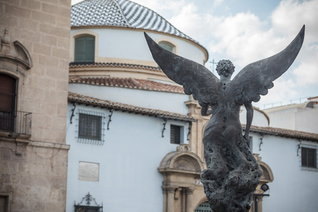MURCIA,SPAIN-SEPTEMBER 22,2017:Sculpture of winged angel in front church,Satn Agustin square,Murcia,Spain.のeditorial素材