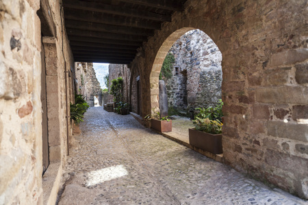 SANTA PAU,SPAIN-MAY 9,2017:Ancient street in Santa Pau,Catalonia,Spain.