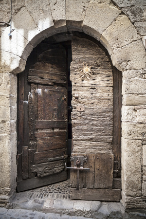 BESALU,SPAIN-MAY 17,2017:Ancient door, medieval village of Besalu,Catalonia,Spain.のeditorial素材