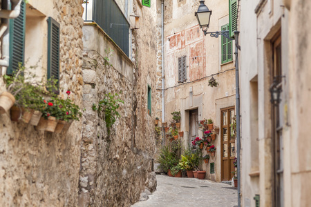 VALLDEMOSSA,SPAIN-MARCH 6,2018: Ancient street view, village of Valldemossa, Majorca Island, Spain.のeditorial素材