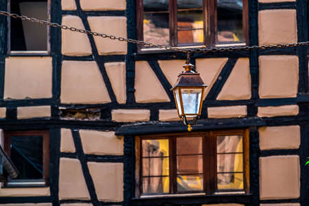 Lantern and typical facade in Riquewhir, Alsace, Franceの写真素材