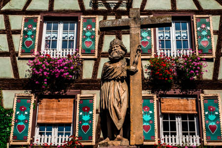 An ancient sculpture in the village of Kaisersberg in Alsace, Franceの写真素材