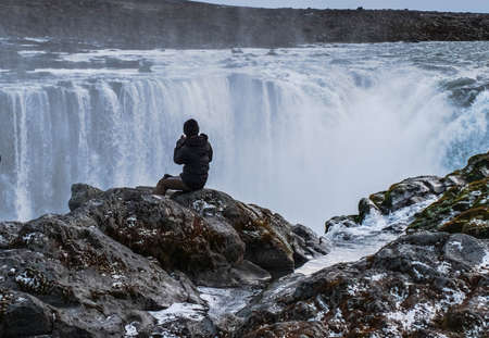 Selfoss waterfall in Northeast Iceland runs through a rock gorgeの写真素材