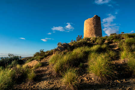 An old marine watchtower in El Campello, Alicante, Spainの写真素材