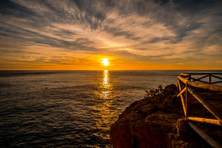 Sunrise in Cala Moraig de Benitatxell, in the Spanish Mediterraneanの写真素材