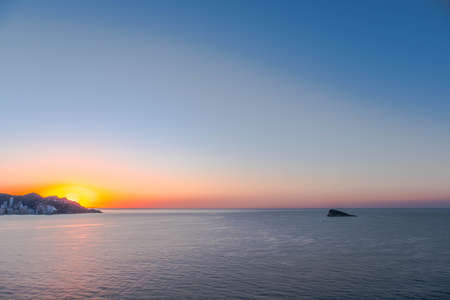 The bay of Benidorm in Spain at sunriseの写真素材