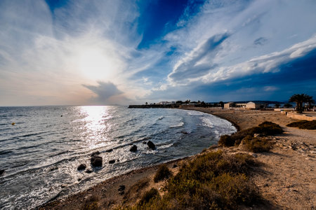 The main beach of the island of Tabarca in the Spanish Mediterranean, at sunsetの写真素材