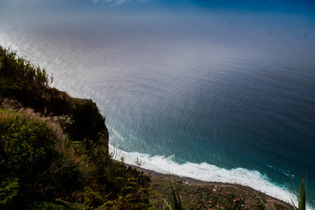 The cliff and the Achadas da Cruz cable car, in Madeiraの写真素材