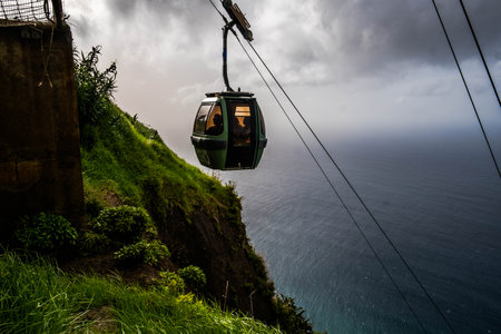 The cliff and the Achadas da Cruz cable car, in Madeiraの写真素材