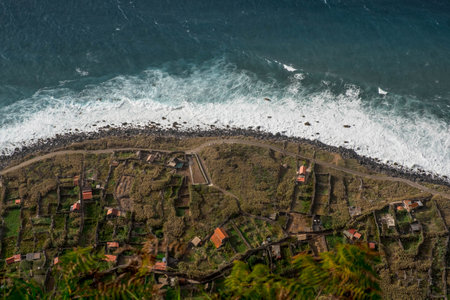 The cliff and the Achadas da Cruz cable car, in Madeira