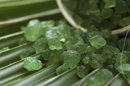 bath salt and the palm leafの写真素材