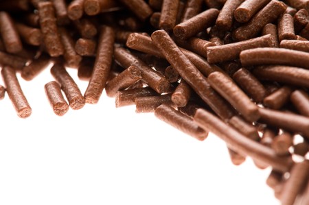 chocolate sprinkles on white background の写真素材