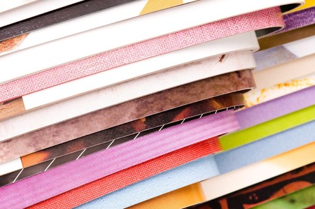 Stack of open magazines
