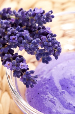 Lavender flowers and jar of glass with peelingの写真素材