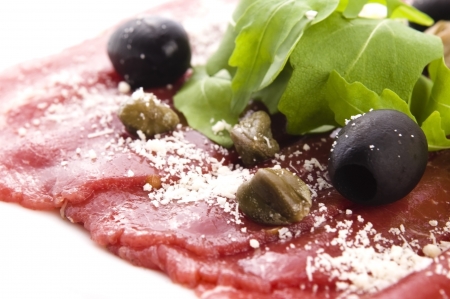 Beef carpaccio with rucola and parmesan の写真素材