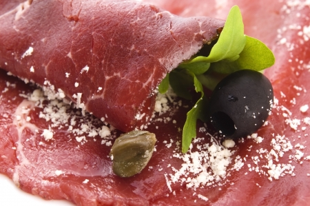 Beef carpaccio with rucola and parmesan の写真素材