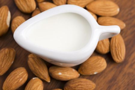 Almond milk with almondsの写真素材
