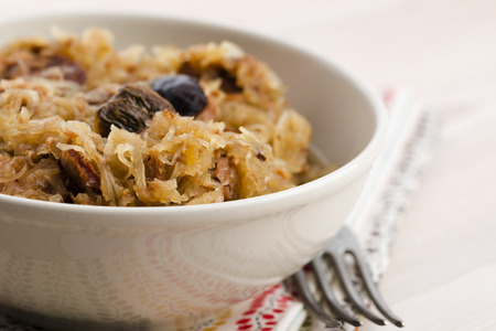 traditional polish sauerkraut (bigos) with mushrooms and plums for christmas の写真素材