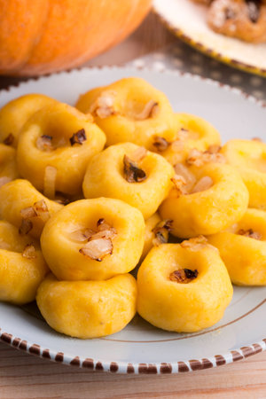 polish noodles ( kluski slaskie ) with potatoe and pumpkinの写真素材