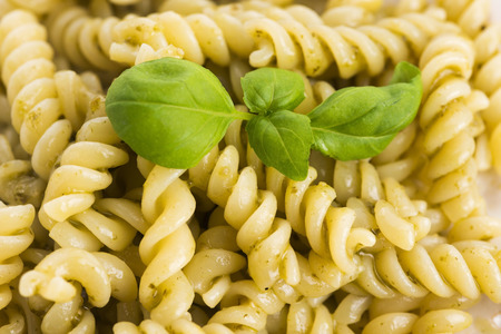 italian fusilli pasta and fresh homemade pesto sauceの写真素材