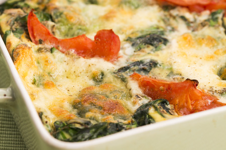 Omelet with vegetables and cheese. Frittataの写真素材