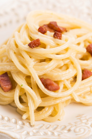 Spaghetti carbonara, a typical italian dishの写真素材