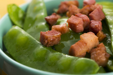 fresh green peas with baconの写真素材