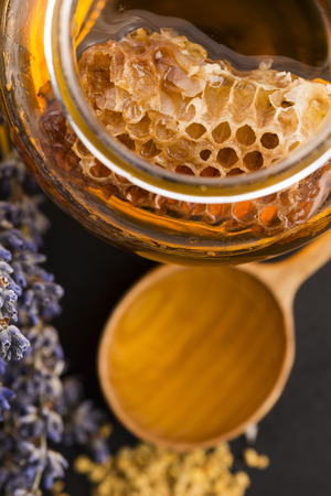 Lavender honey with bee pollen and honey combの写真素材