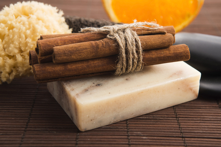 Bar of soap with cinnamon and orangeの写真素材