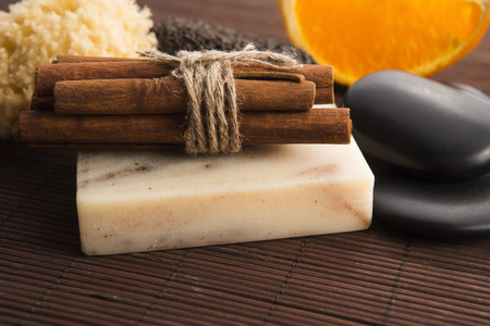 Bar of soap with cinnamon and orangeの写真素材