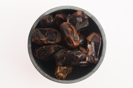 Dried dates fruit in a bowl