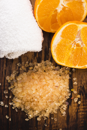 Orange bath salt and fruitsの写真素材
