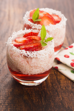 A serving of strawberry over tapioca and jellyの写真素材
