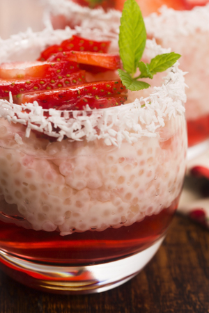 A serving of strawberry over tapioca and jellyの写真素材