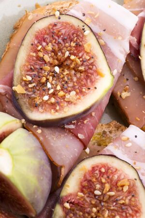 Sandwich with prosciutto, fig and olive oilの写真素材