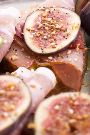 Sandwich with prosciutto, fig and olive oilの写真素材