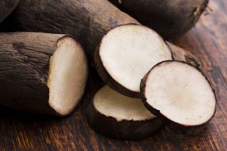Fresh Yacon roots on woodenの写真素材