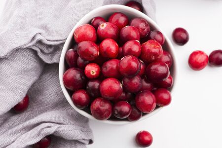 Ceramic bowl of Cranberry on white backgroundの写真素材
